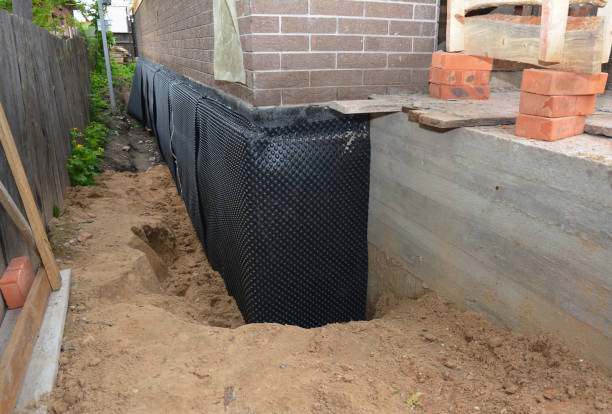 SJ Waterproofing Pros technician performing targeted Sump Pump Installation assessment in Gordonsville, VA